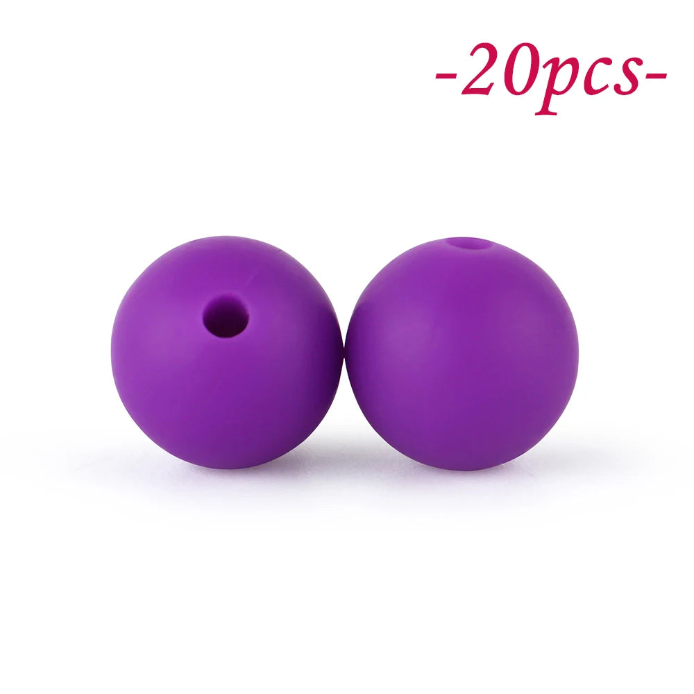 Two round purple silicone beads for DIY jewelry making