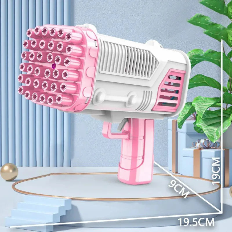 A pink bubble gun with 36 holes is displayed on a surface, showing its size and design.
