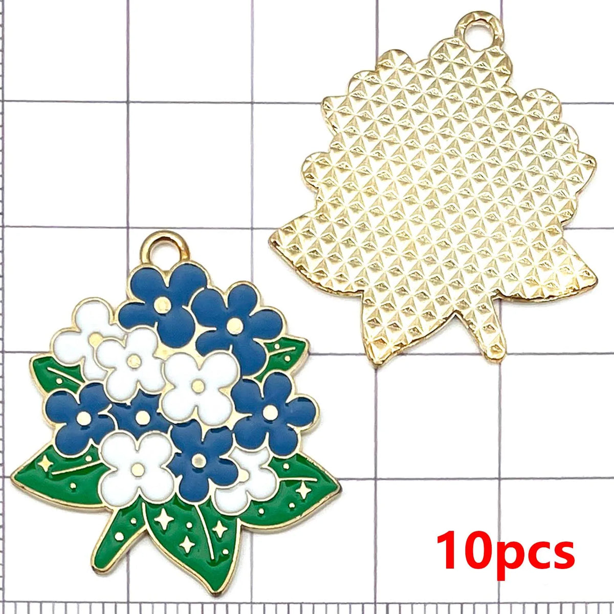 A set of ten gold-colored enamel flower charms, including a large star shape and a detailed blue and white flower design.