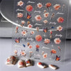 Sheet of 5D bronzing gothic nail art stickers featuring flowers and butterflies on a clear background