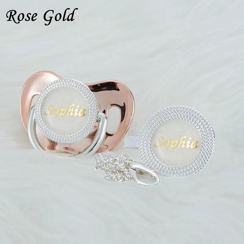 Rose gold rhinestone pacifier and clip set with a name charm