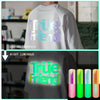 White t-shirt displaying the text True Friend in holographic and luminous green colors.