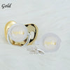 Gold-toned rhinestone pacifier and clip set with a circular pendant featuring the name Sophia