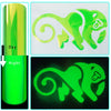 A glow-in-the-dark heat transfer vinyl design of a stylized elephant silhouette shown in day and night lighting.