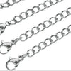 A collection of stainless steel jewelry extender chains shown in various lengths and angles.