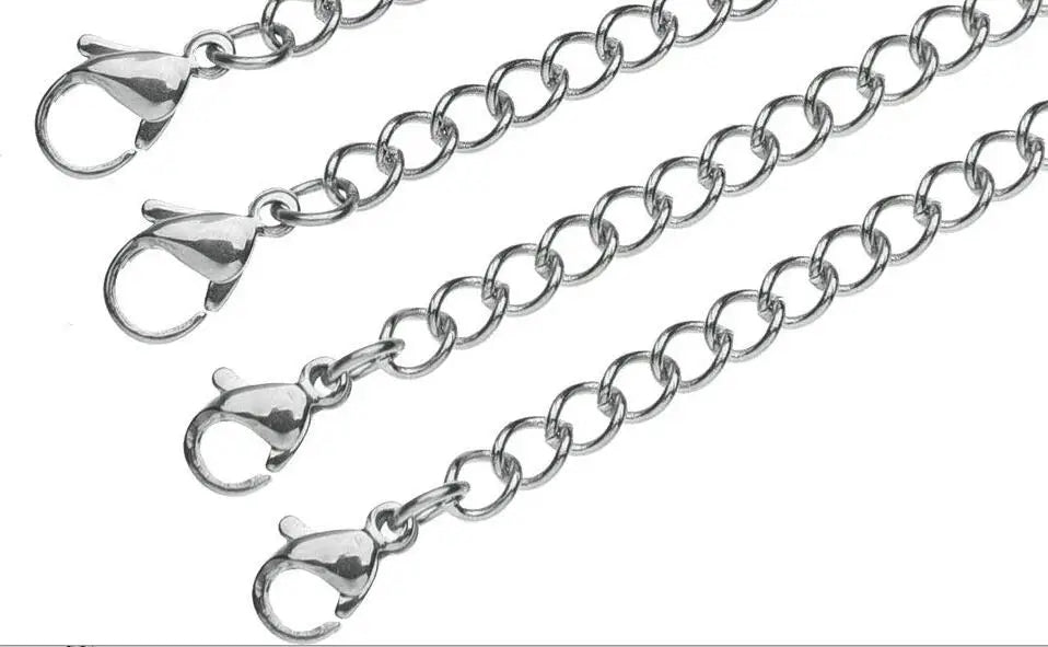 A collection of stainless steel jewelry extender chains shown in various lengths and angles.